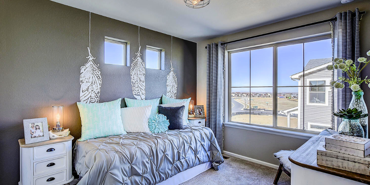 Bedroom with big windows. 