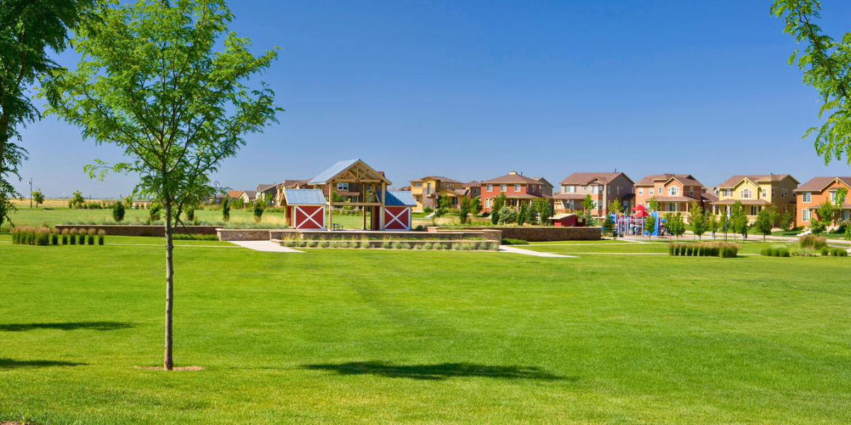 Neighborhood park at Reunion with a playground. Your July Home Checklist: Tips for Curb Appeal, Comfort, and Community Connection