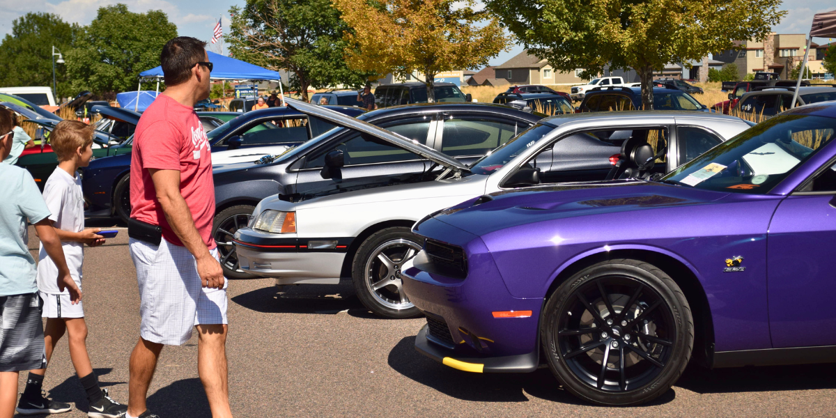 Cars displayed at a car show.