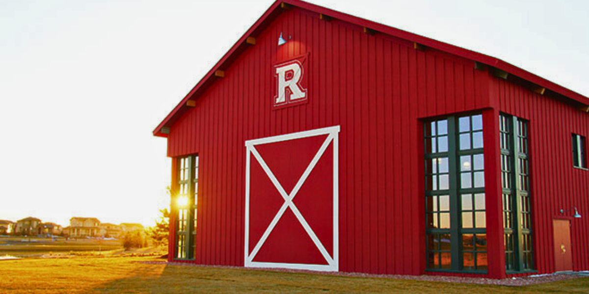 Red barn exterior of Reunion's Rec Center. 
